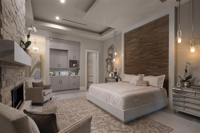 Bedroom with discreet ceiling vents for a concealed ducted system